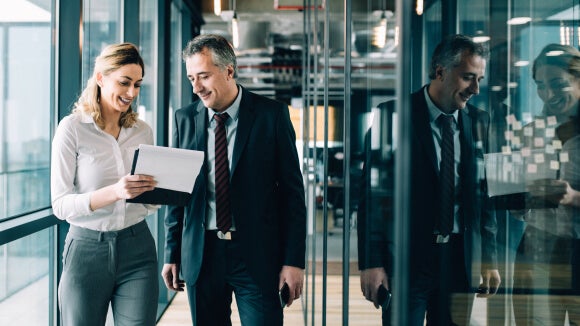 Man and woman in office man-and-woman-in-office