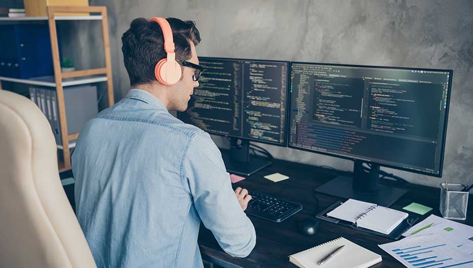 man working on laptop
