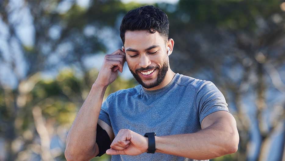 man checking watch