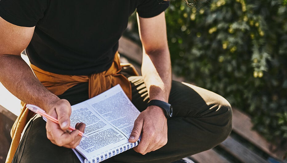 man taking notes