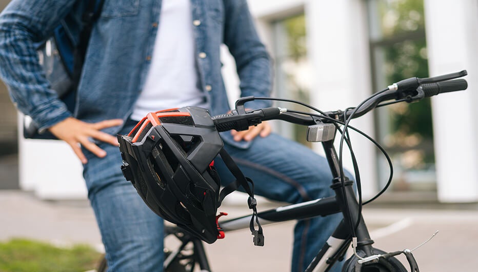 man sitting on bicycle