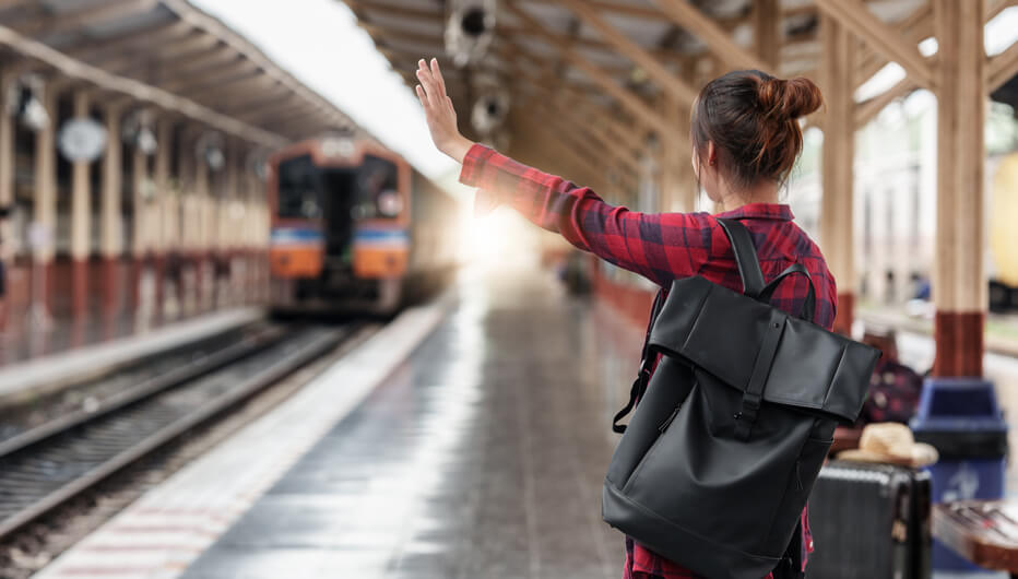 Woman hailing train