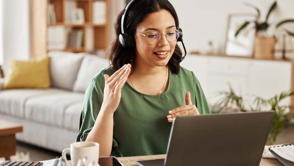 Home customer support, laptop video call and woman explain consu