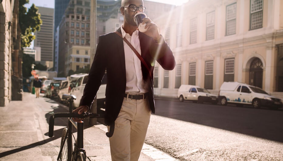 man walking with bike